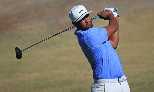 Tony Finau plays his shot from the eighth tee during the first round of The American Express tourna...