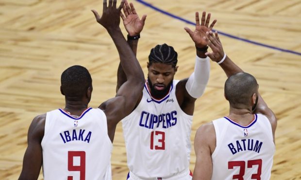 Serge Ibaka, Paul George, and Nic Batum of the Los Angeles Clippers (Photo by Douglas P. DeFelice/G...