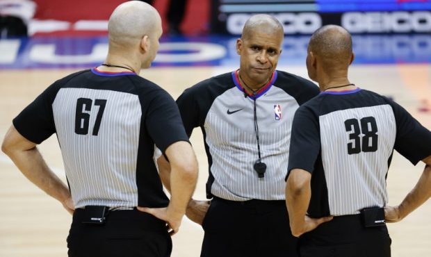 NBA Officials talking during a game between the Utah Jazz and the Philadelphia 76ers (Photo by Tim ...