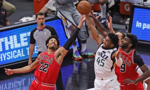 Donovan Mitchell of the Utah Jazz fights for a rebound against the Chicago Bulls (Photo by Jonathan...