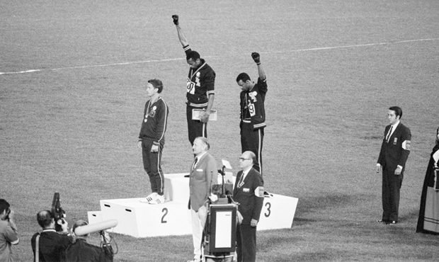 Tommie Smith and John Carlos, gold and bronze medalists in the 200-meter run at the 1968 Olympic Ga...