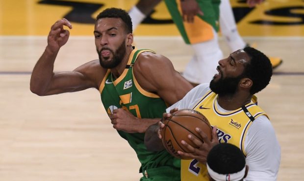 Rudy Gobert of the Utah Jazz defends Andre Drummond of the Los Angeles Lakers (Photo by Harry How/G...