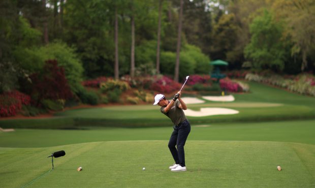 Mike Weir of Canada plays his shot from the 12th tee during the second round of the Masters at Augu...