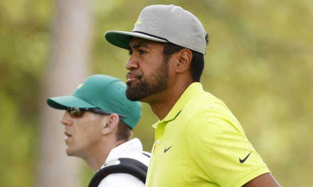 Tony Finau of the United States walks up the second fairway during the final round of the Masters a...