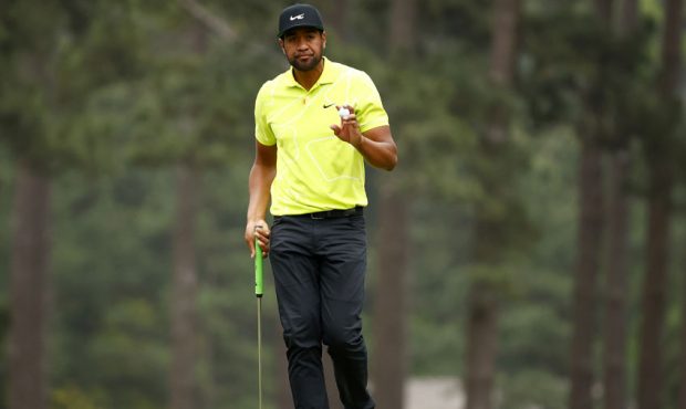 Tony Finau of the United States reacts to his putt on the eighth green during the second round of t...