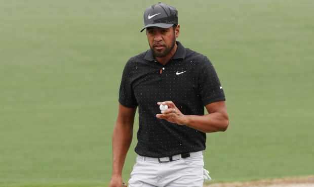 Tony Finau of the United States reacts on the second green during the third round of the Masters at...