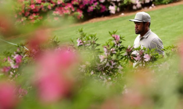 Tony Finau of the United States walks to the sixth green during the first round of the Masters at A...