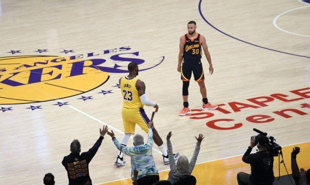 LeBron James of the Los Angeles Lakers and Steph Curry of the Golden State Warriors (Photo by Kevor...