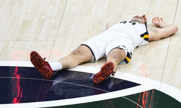Utah Jazz forward Bojan Bogdanovic lays on the ground after missing the game tying three-point shot...