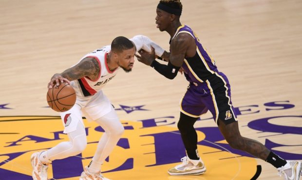 Portland Trail Blazers guard Damian Lillard and Los Angeles Lakers guard Dennis Schroder (Photo by ...