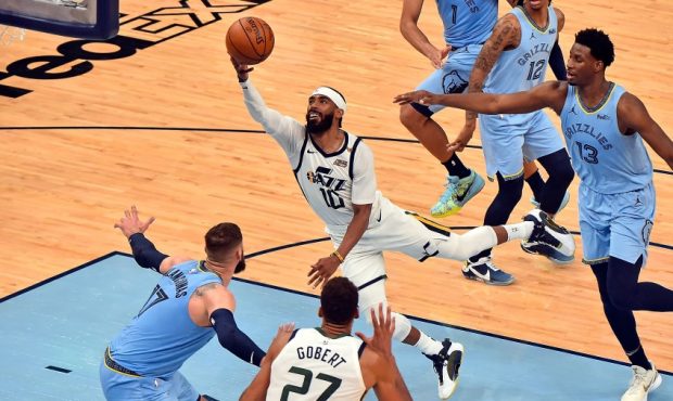 Utah Jazz guard Mike Conley shoots against the Memphis Grizzlies (Photo by Justin Ford/Getty Images...