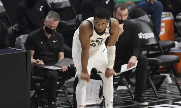 Utah Jazz guard Donovan Mitchell stands near the sidelines against the Los Angeles Clippers (Photo ...