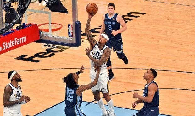 Utah Jazz guard Jordan Clarkson shoots over the Memphis Grizzlies (Photo by Justin Ford/Getty Image...