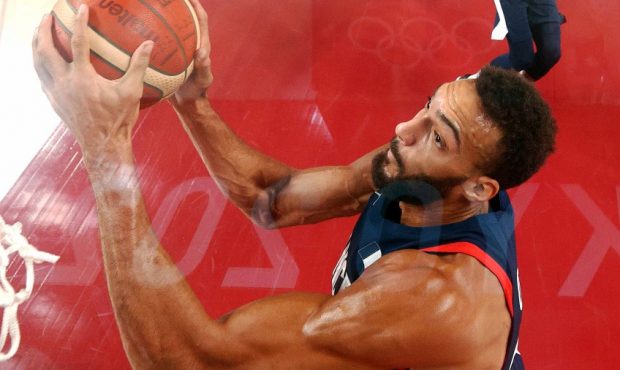 Rudy Gobert goes up for a dunk for France against Iran at the Olympics. (Photo by Gregory Shamus/Ge...