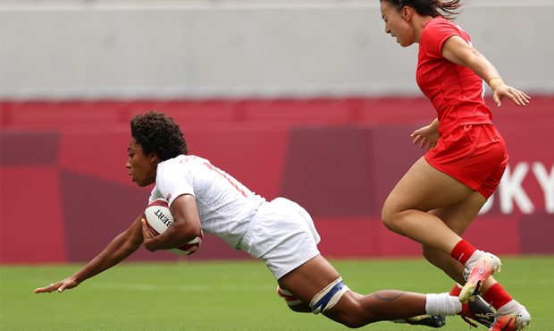 CHOFU, JAPAN - Kris Thomas of Team United States dives over to score a try in the Women’s pool C ...