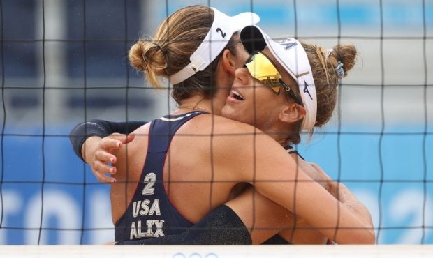 April Ross #1 of Team United States and Alix Klineman #2 celebrate after defeating Team Spain...