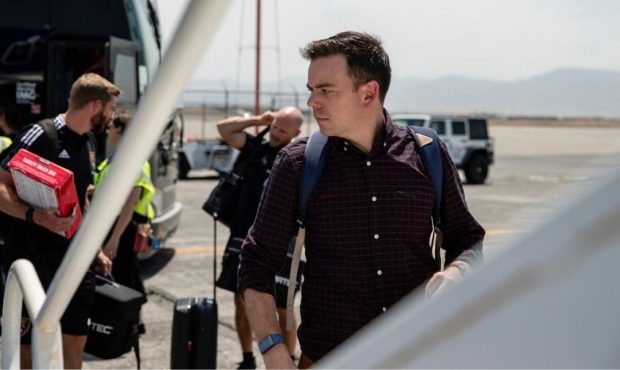 Real Salt Lake General Manager Elliot Fall boards a plane prior to RSL's road fixture against Seatt...
