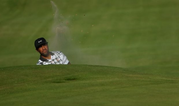 Tony Finau of the United States plays a shot on the 18th hole during Day Three of The 149th Open at...