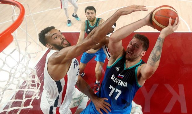 Rudy Gobert of France challenges Luka Doncic of Slovenia (Photo by Gregory Shamus/Getty Images)...