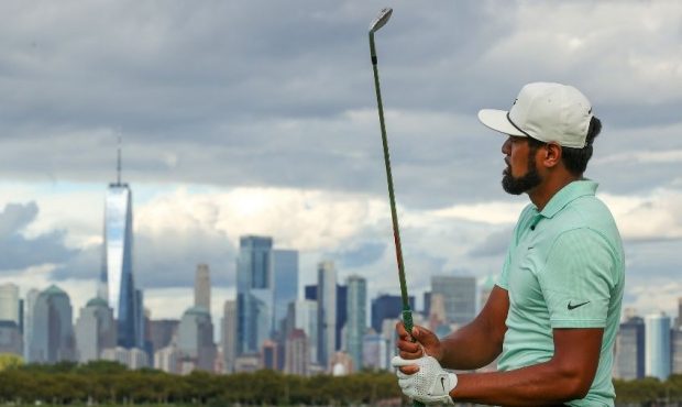 Tony Finau of the United States plays his shot from the 14th tee during the final round of THE NORT...
