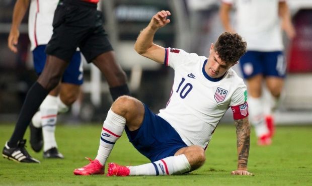 Christian Pulisic #10 of United States gathers himself after being knocked to the ground by Alistai...