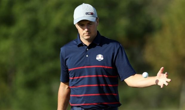 Jordan Spieth of team United States tosses a ball during Friday Morning Foursome Matches of the 43r...