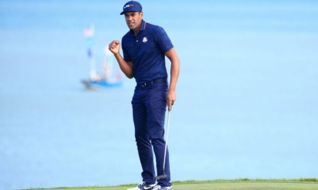 Tony Finau of team United States celebrates on the 13th green during Saturday Afternoon Fourball Ma...