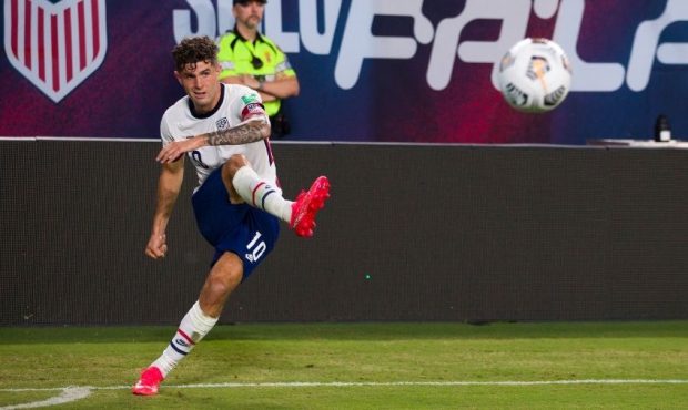 Christian Pulisic #10 of United States takes a corner kick against Canada during the first half of ...