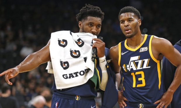 Utah Jazz guards Jared Butler and Donovan Mitchell talk (Photo by Ronald Cortes/Getty Images)...