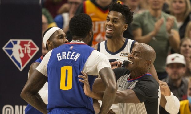 Utah Jazz center Hassan Whiteside gets in a shoving match with the Denver Nuggets JaMychal Green (P...