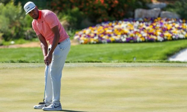 Tony Finau of the United States putts for birdie on the seventh green during the second round of TH...