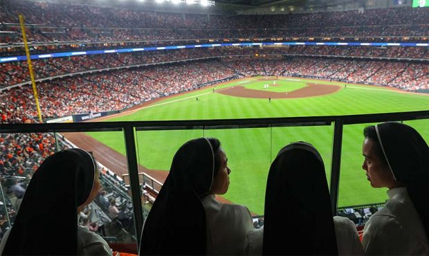HOUSTON, TEXAS - OCTOBER 26: The "Rally Nuns" cheer during the third inning in Game One of the Worl...