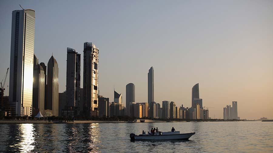 ABU DHABI, UNITED ARAB EMIRATES - FEBRUARY 05: A general view of the city skyline at sunset from Dh...