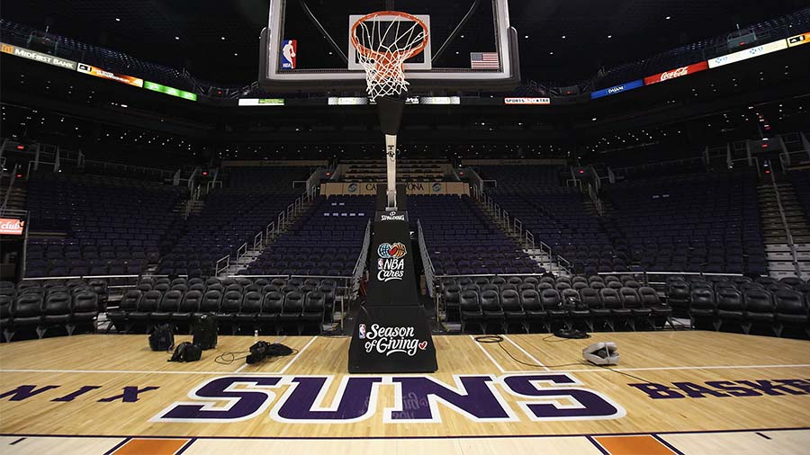 PHOENIX - DECEMBER 11: The Phoenix Suns logo is seen on the court before the NBA game against the O...