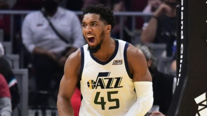 Utah Jazz guard Donovan Mitchell celebrates against the Cleveland Cavaliers (Photo by Jason Miller/...