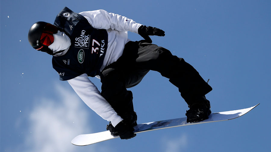 Shaun White of the United States takes a training run for the men's snowboard halfpipe final during...