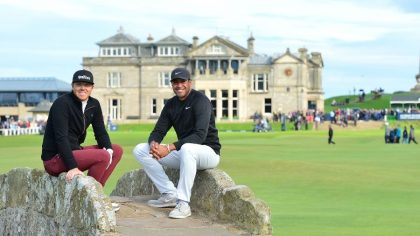 Tony Finau of The United States and Ryan Smith on the Swilken Bridge during Day three of the Alfred...
