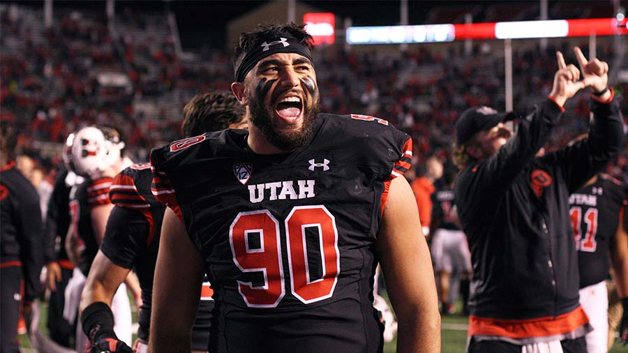 SALT LAKE CITY, UT - OCTOBER 16: Devin Kaufusi #90 of the Utah Utes reacts as he leaves the field a...