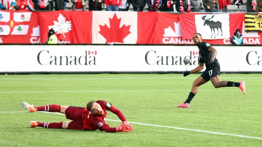 Cyle Larin #17 of Canada and Matt Turner #1 of the United States watch the ball go into the back of...