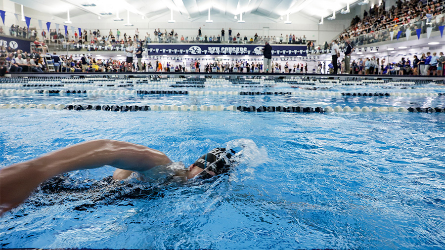 Swimmers swim at the 6A Swimming State Championships at Brigham Young University in Provo on Saturd...