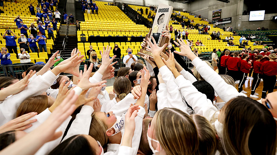 Dixie High School celebrates its win in the 4A girls drill team state championships at the UCCU Cen...