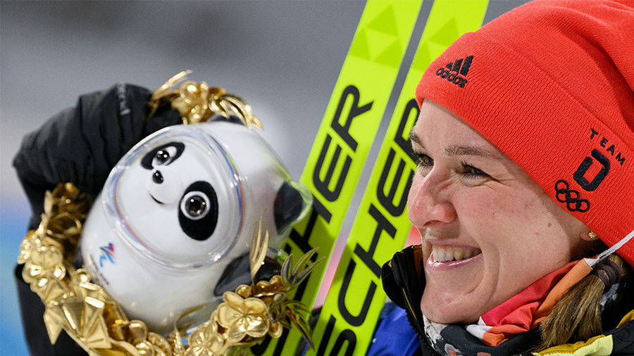 ZHANGJIAKOU, CHINA - FEBRUARY 07: Gold medallist Denise Herrmann of Team Germany celebrates during ...