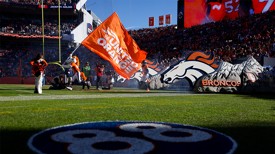 DENVER, COLORADO - DECEMBER 12: A #88 logo is seen on the field in memory of the late former Denver...