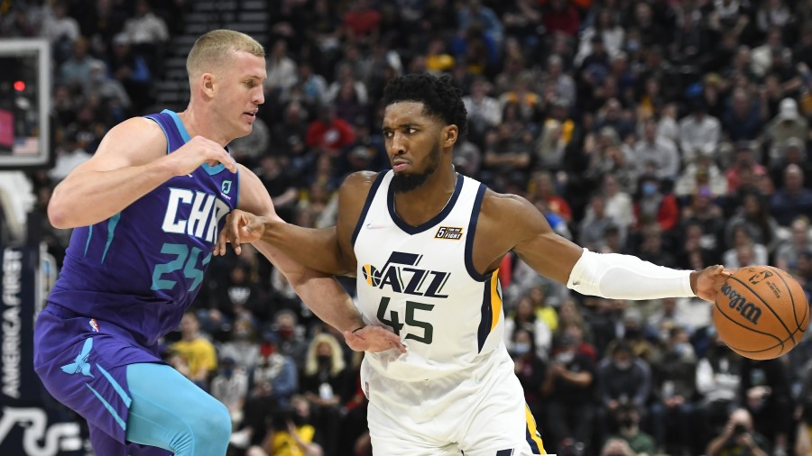 Utah Jazz guard Donovan Mitchell drives against the Charlotte Hornets (Photo by Alex Goodlett/Getty...