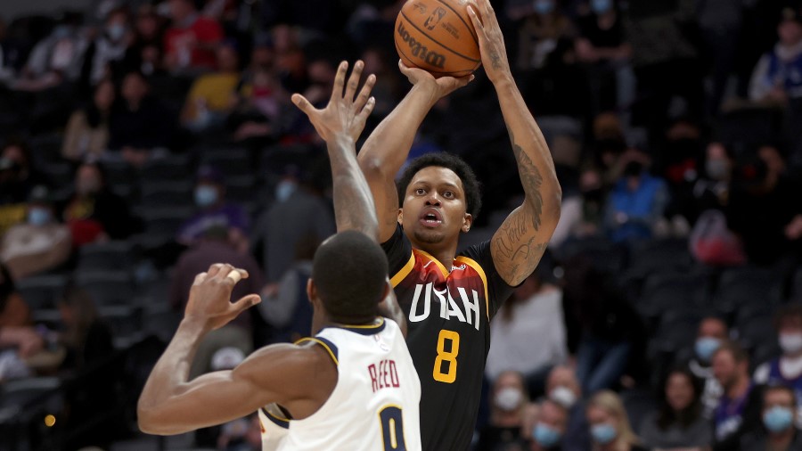 Utah Jazz forward Rudy Gay shoots against the Denver Nuggets (Photo by Matthew Stockman/Getty Image...