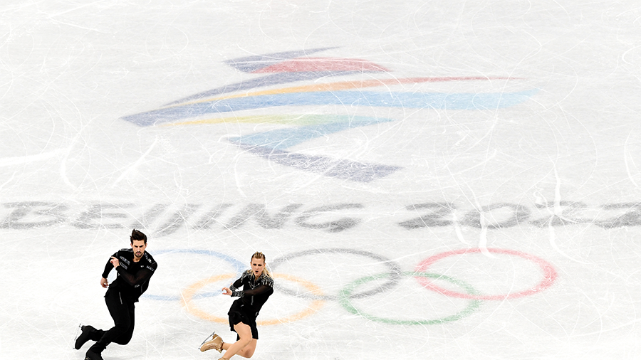 BEIJING, CHINA - FEBRUARY 04: Madison Hubbell and Zachary Donohue of Team United States skate in th...