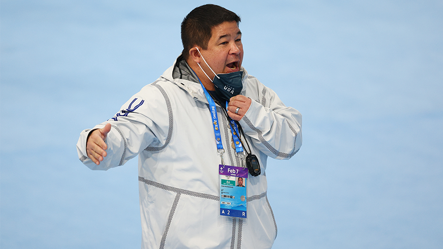 BEIJING, CHINA - FEBRUARY 07: Team United States Coach Ryan Shimabukuro gives instructions to Britt...