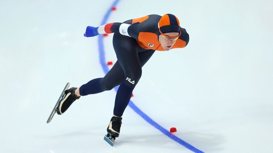 Ireen Wust of Team Netherlands skates on the way to setting a new Olympic record time of 1:53.28 du...