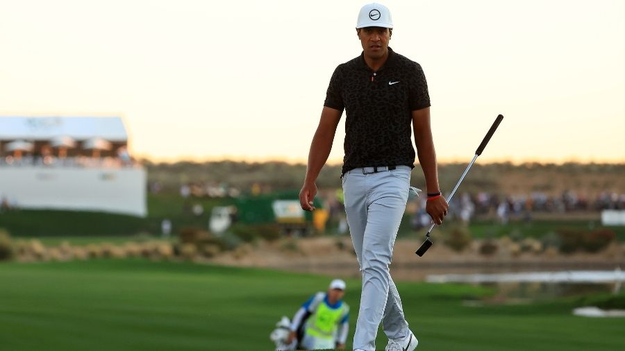 Tony Finau of the United States walks on the 18th hole during the first round of the WM Phoenix Ope...