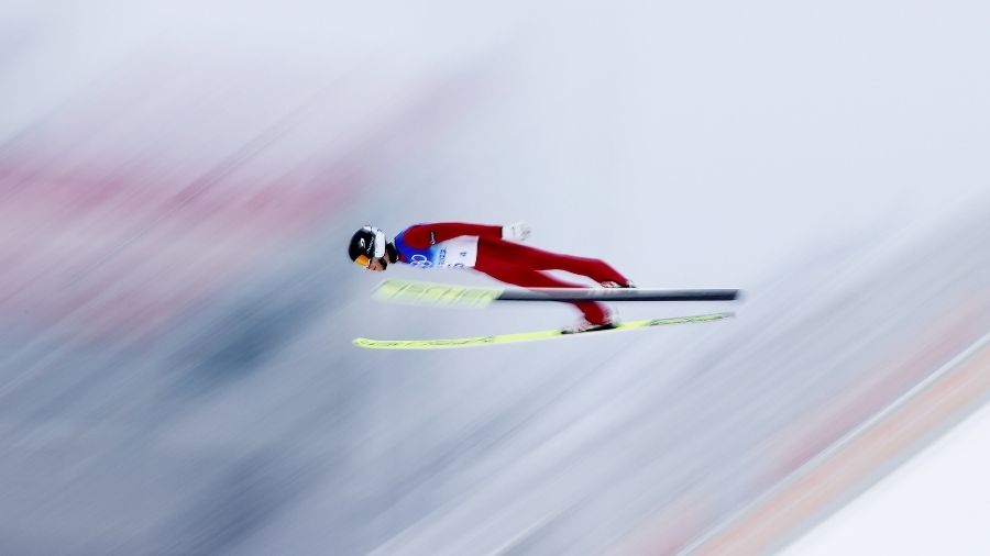 Eero Hirvonen of Team Finland competes during the Ski Jumping First Round as part of Biathlon Team ...